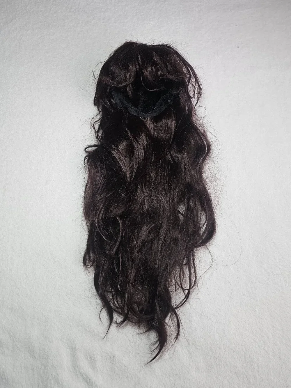 Long, dark brown synthetic hair wig with bangs